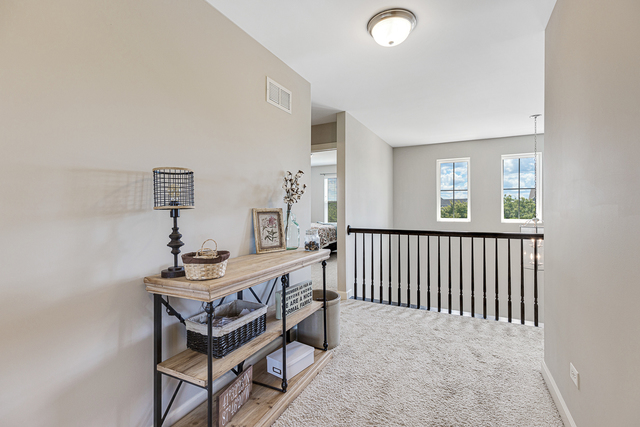 4380 John Milton Road Elgin, IL 60124 - Photo 15 of 30 a bedroom with furniture and a window