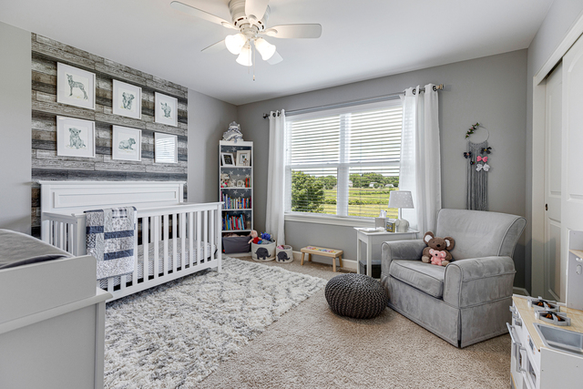 4380 John Milton Road Elgin, IL 60124 - Photo 20 of 30 a living room with furniture and a large window