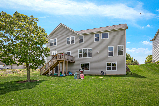 4380 John Milton Road Elgin, IL 60124 - Photo 25 of 30 a view of a house with a backyard