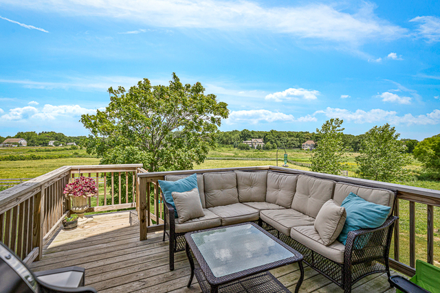 4380 John Milton Road Elgin, IL 60124 - Photo 26 of 30 a balcony with wooden floor and city view