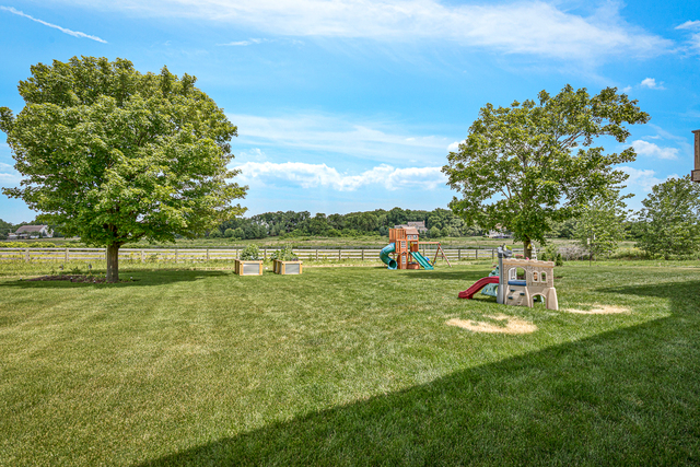 4380 John Milton Road Elgin, IL 60124 - Photo 28 of 30 a view of a lake with a yard
