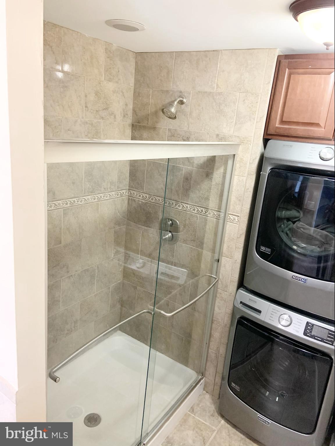 4784 Lake Road Newfield, NJ 08344 - Photo 11 of 16 Fully tiled bathroom and shower.