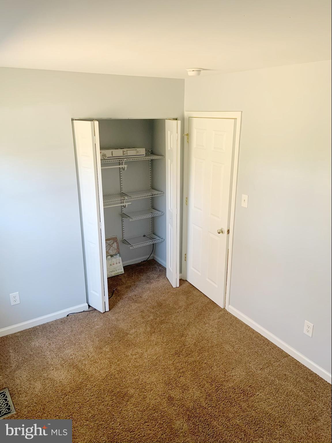 4784 Lake Road Newfield, NJ 08344 - Photo 13 of 16 3rd Bedroom closet has shelving system