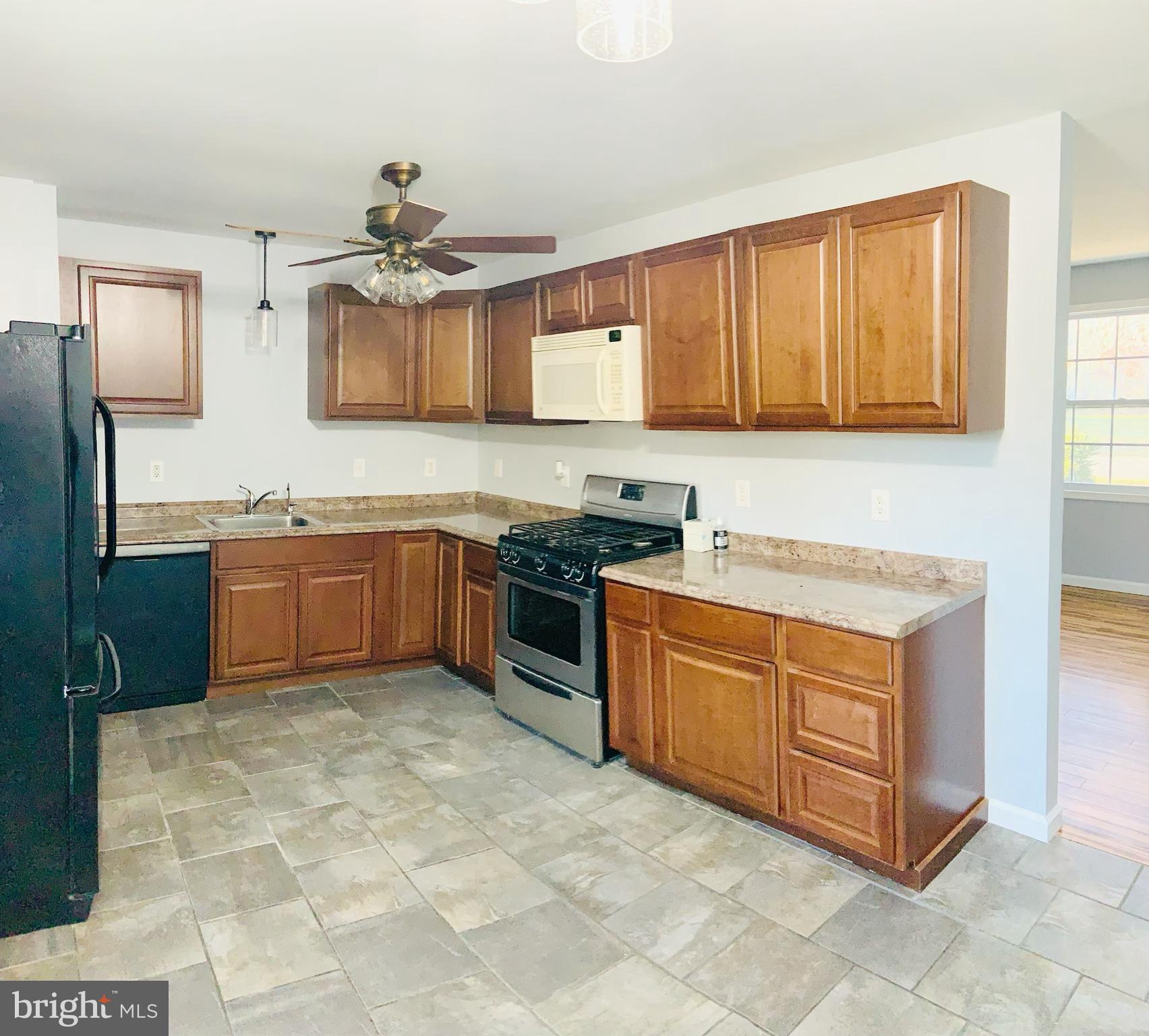 4784 Lake Road Newfield, NJ 08344 - Photo 6 of 16 Kitchen cabinets installed 2 years ago.