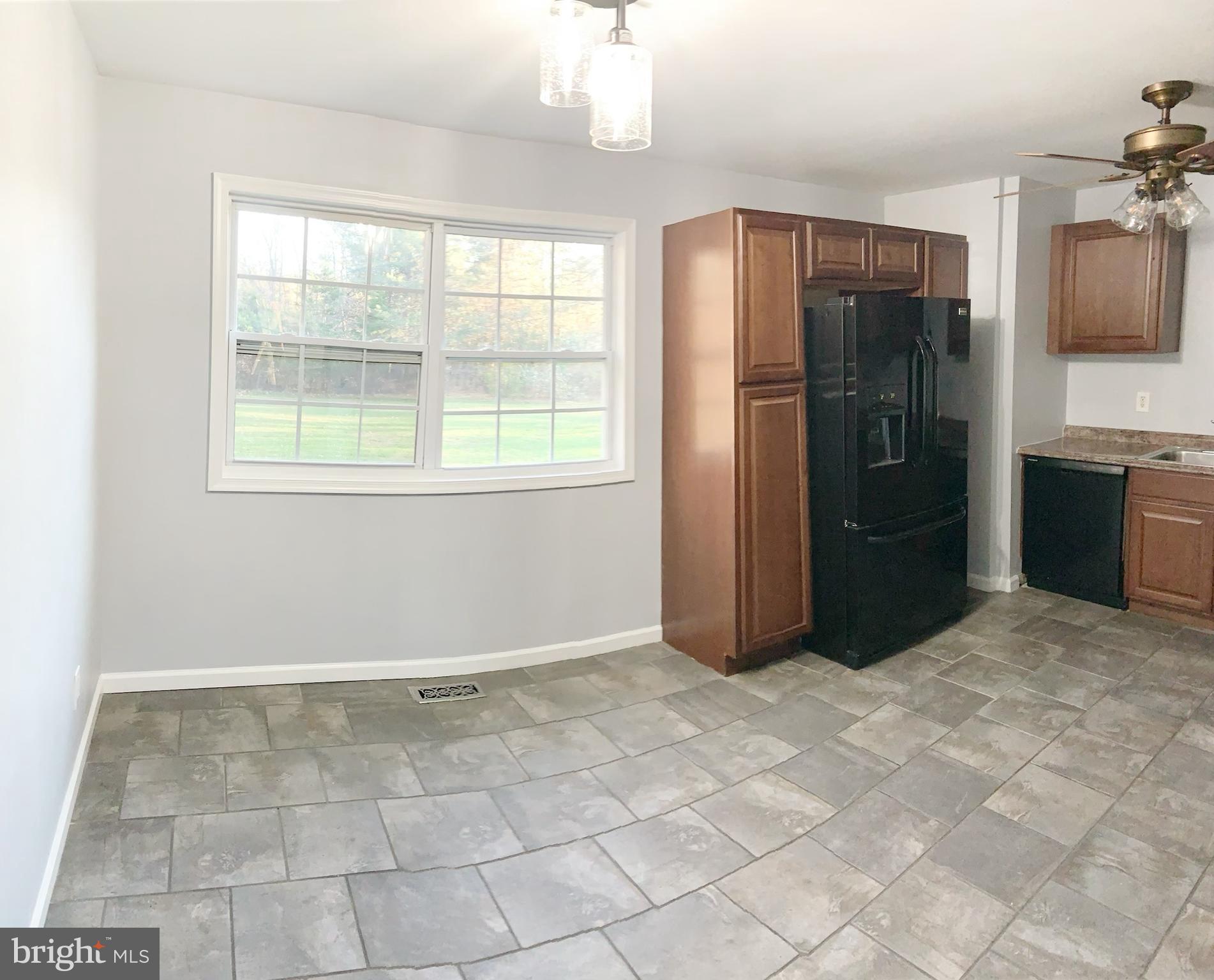 4784 Lake Road Newfield, NJ 08344 - Photo 7 of 16 Kitchen tiled floor