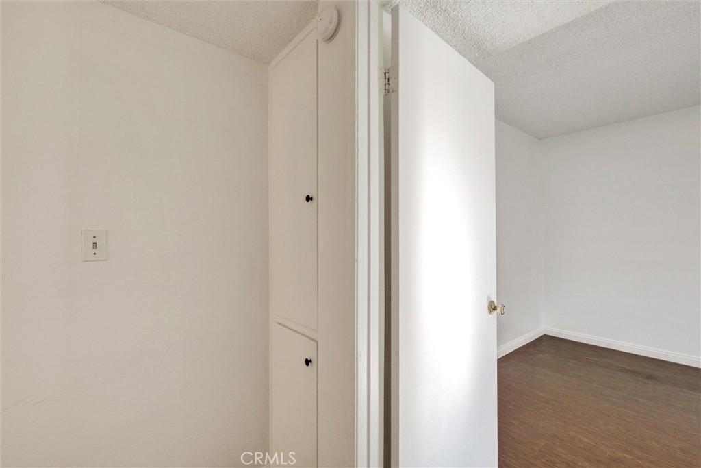 7033 Stewart And Gray Road, Unit 24 Downey, CA 90241 - Photo 17 of 39 a view of a hallway