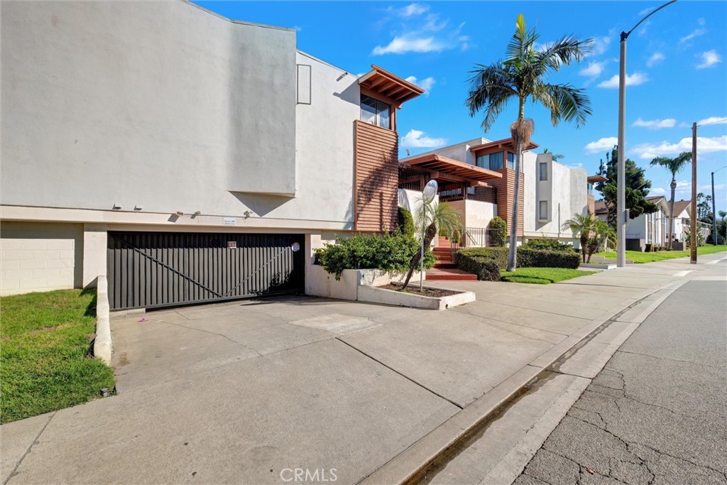 7033 Stewart And Gray Road, Unit 24 Downey, CA 90241 - Photo 2 of 39 a view of a street with houses