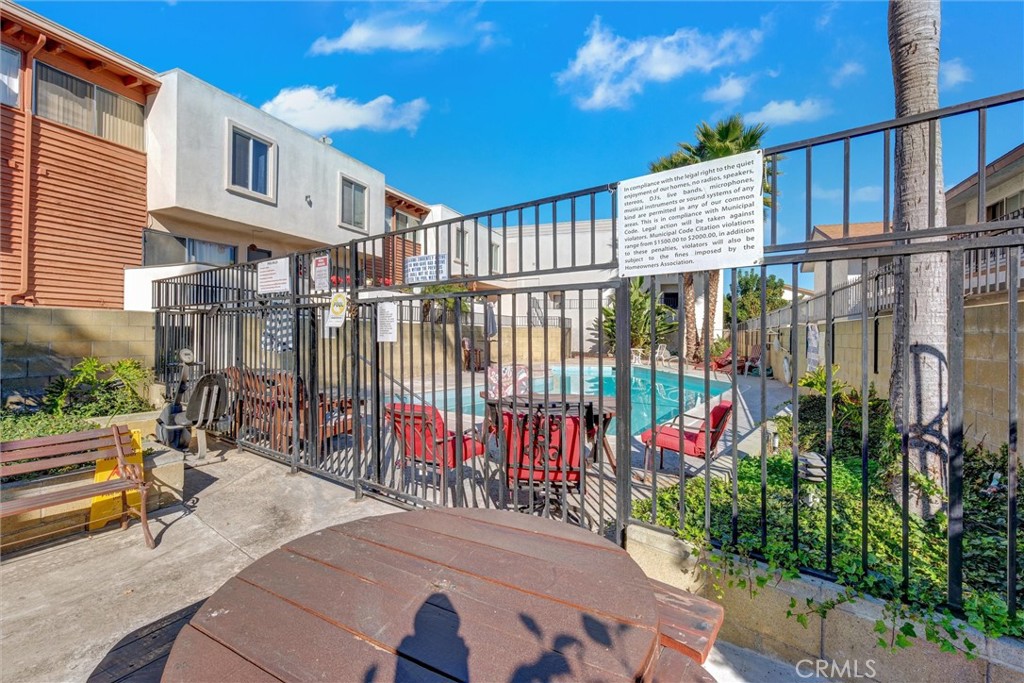 7033 Stewart And Gray Road, Unit 24 Downey, CA 90241 - Photo 33 of 39 a view of a wrought iron stairs