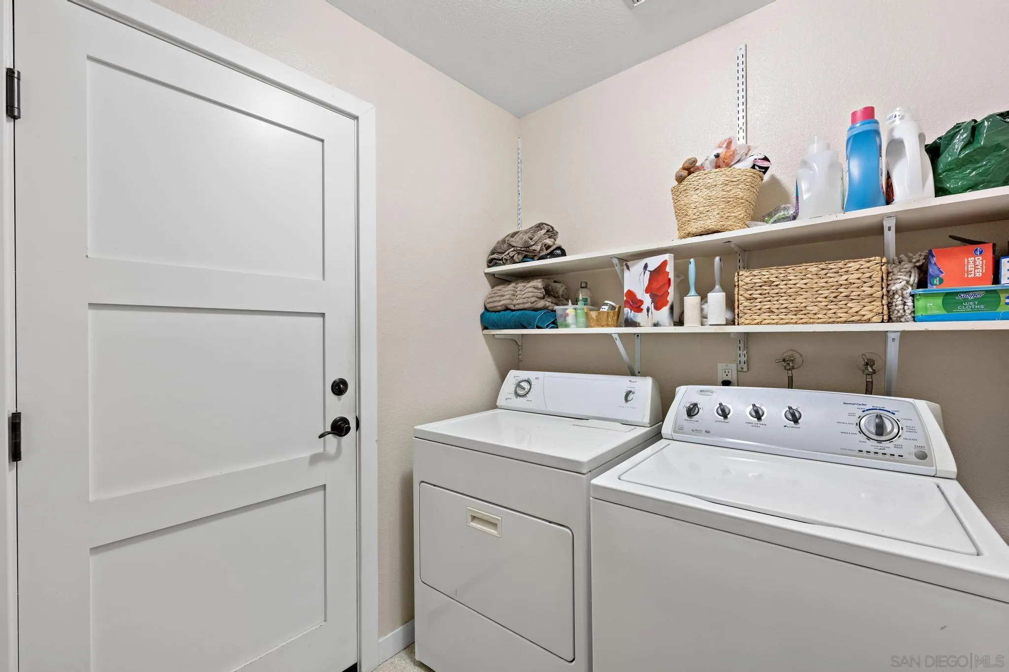 149 Beechtree Drive Encinitas, CA 92024 - Photo 19 of 55 a utility room with dryer and washer