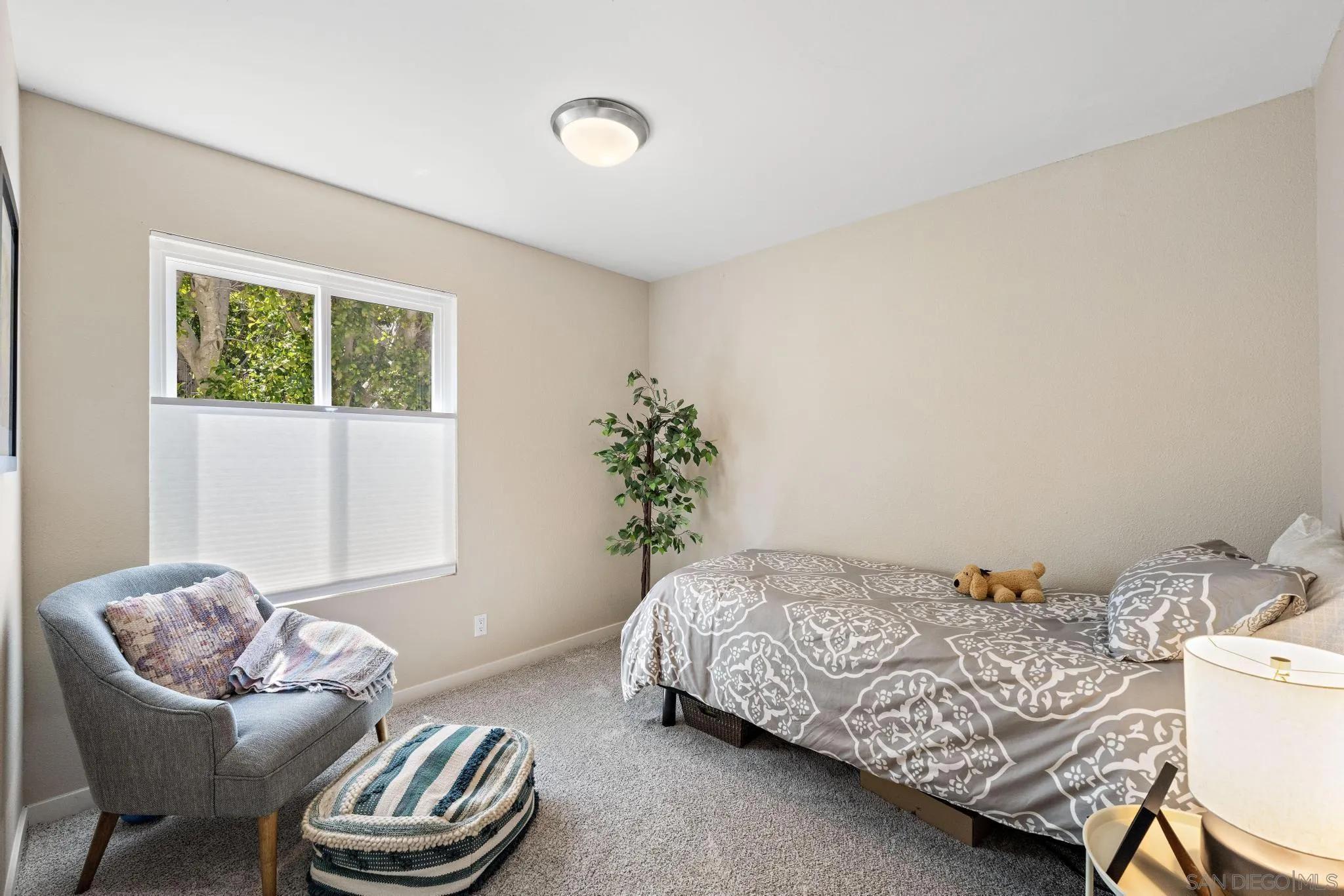 149 Beechtree Drive Encinitas, CA 92024 - Photo 20 of 55 a bedroom with a bed and a couch