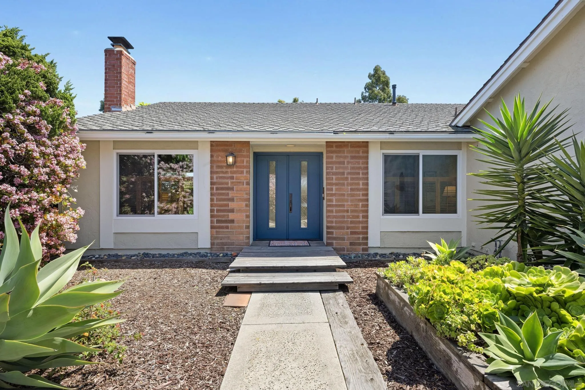 149 Beechtree Drive Encinitas, CA 92024 - Photo 2 of 55 a front view of a house with a yard