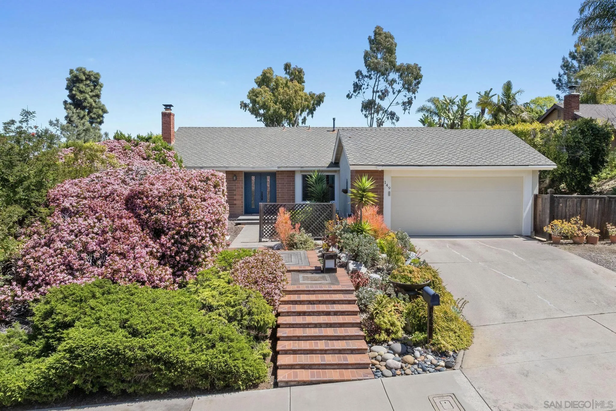 149 Beechtree Drive Encinitas, CA 92024 - Photo 42 of 55 front view of a house with a yard