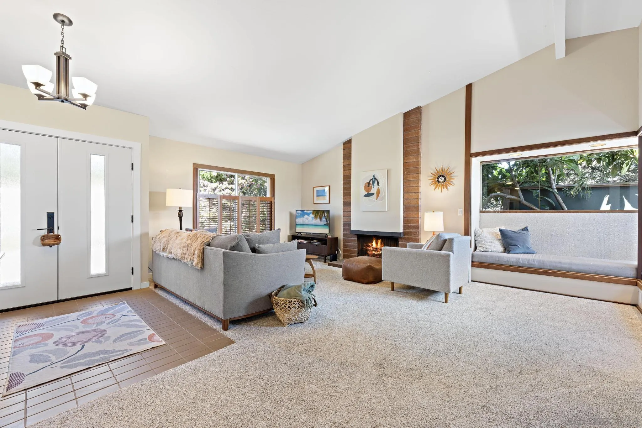 149 Beechtree Drive Encinitas, CA 92024 - Photo 7 of 55 a living room with furniture and a large window