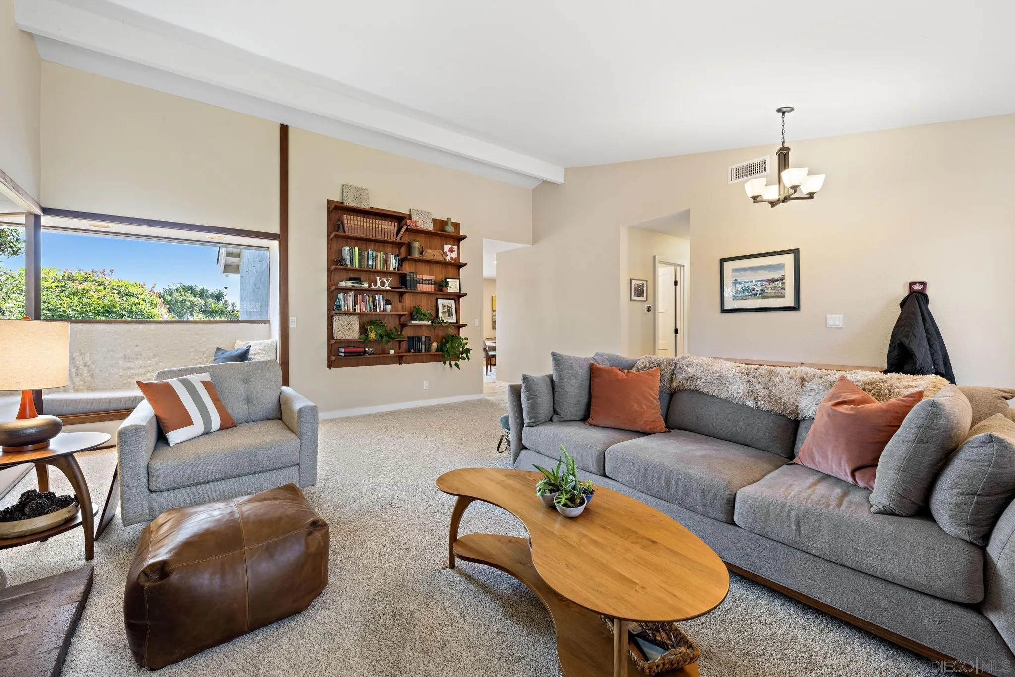 149 Beechtree Drive Encinitas, CA 92024 - Photo 9 of 55 a living room with furniture and a large window