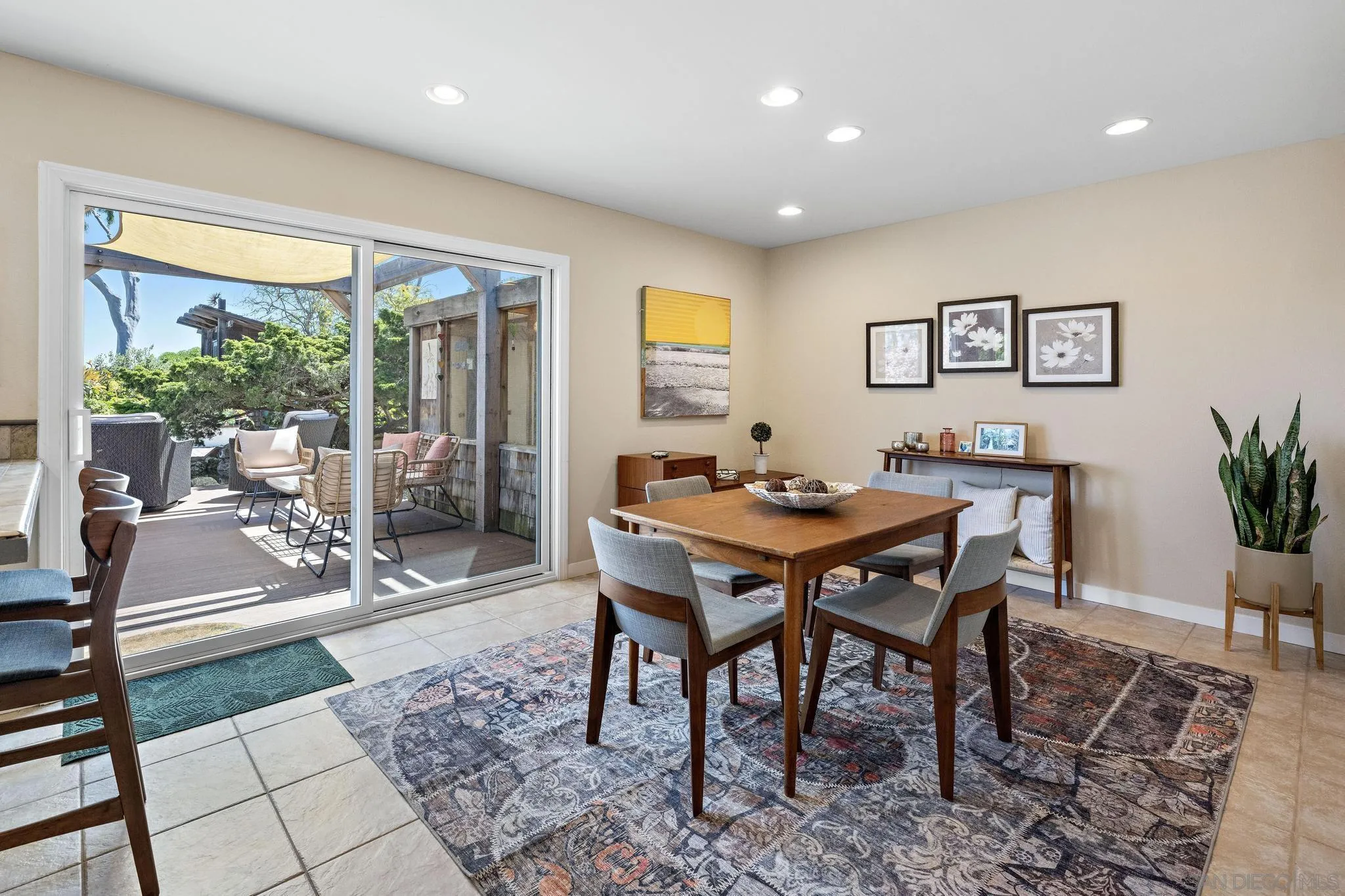 149 Beechtree Drive Encinitas, CA 92024 - Photo 10 of 55 a view of a dining room with furniture window and outside view