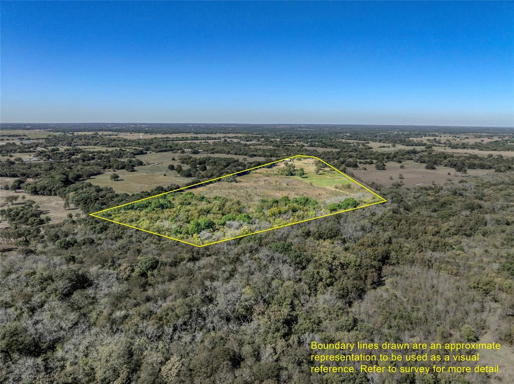 4231 Spalding Road Sherman, TX 75092 - Photo 8 of 13 Aerial overview of property's location featuring a heavily wooded area and property boundaries highlighted