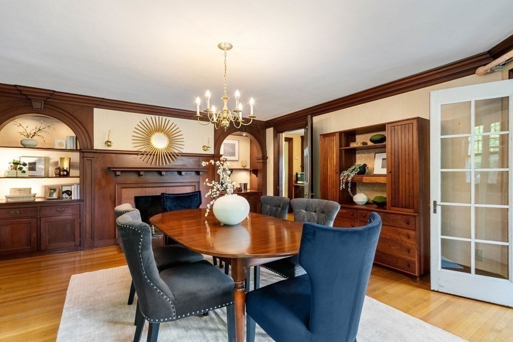 24 Percy Road Lexington, MA 02421 - Photo 11 of 38 a view of a dining room with furniture and wooden floor