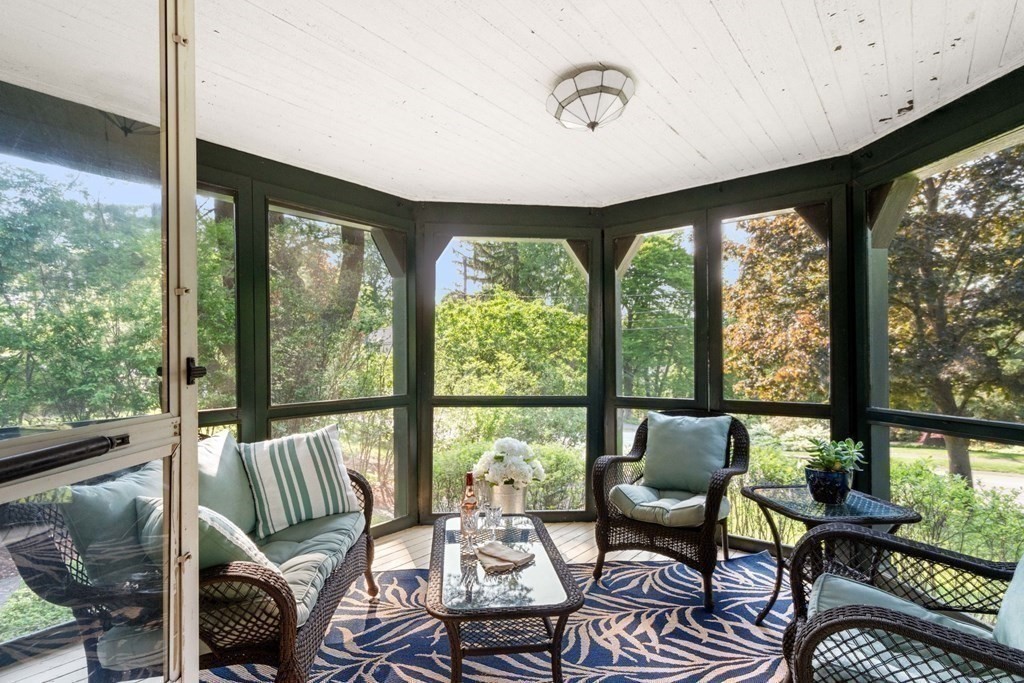 24 Percy Road Lexington, MA 02421 - Photo 12 of 38 a living room with furniture and a large window