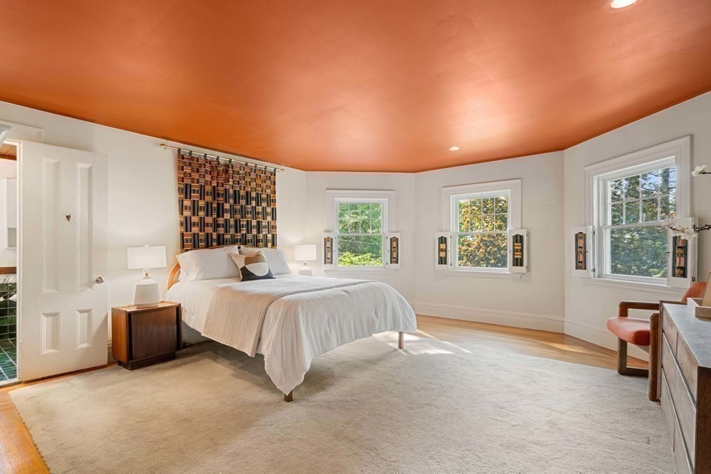 24 Percy Road Lexington, MA 02421 - Photo 19 of 38 a spacious bedroom with a bed and a window