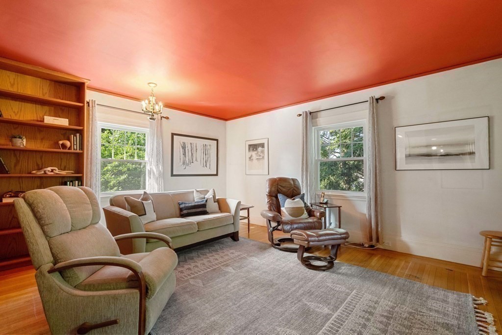 24 Percy Road Lexington, MA 02421 - Photo 25 of 38 a living room with furniture and a large window