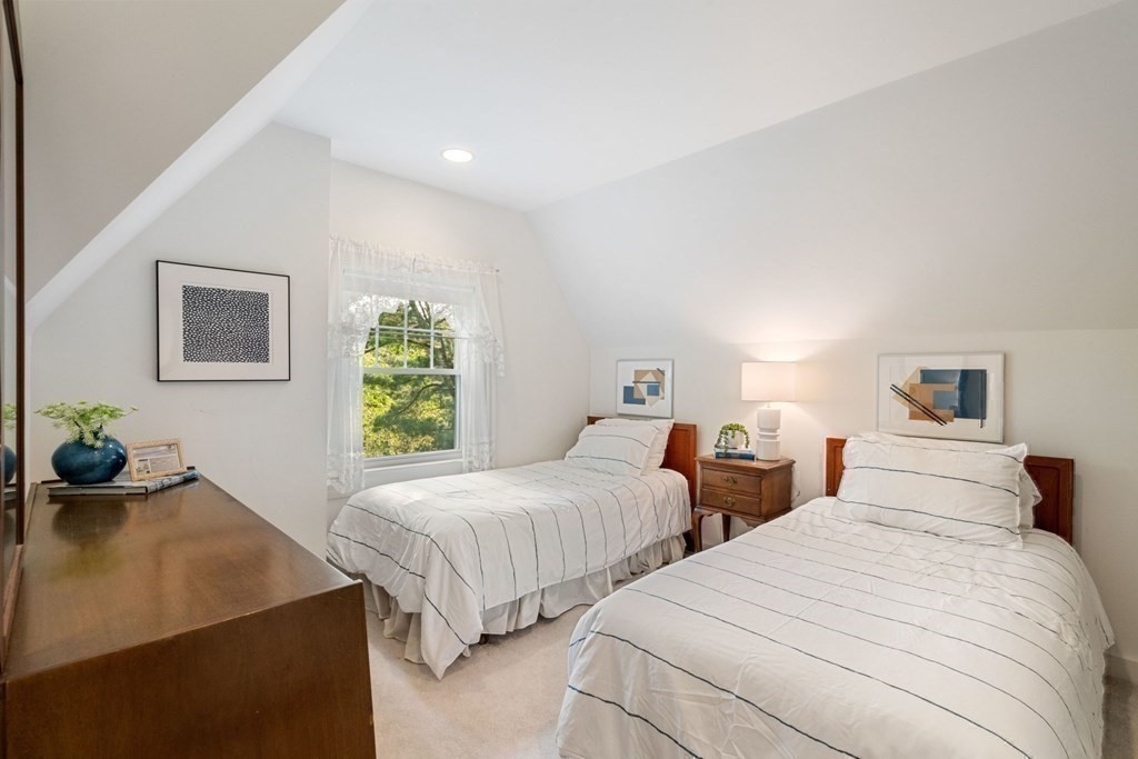 24 Percy Road Lexington, MA 02421 - Photo 26 of 38 a bedroom with two beds and a couch