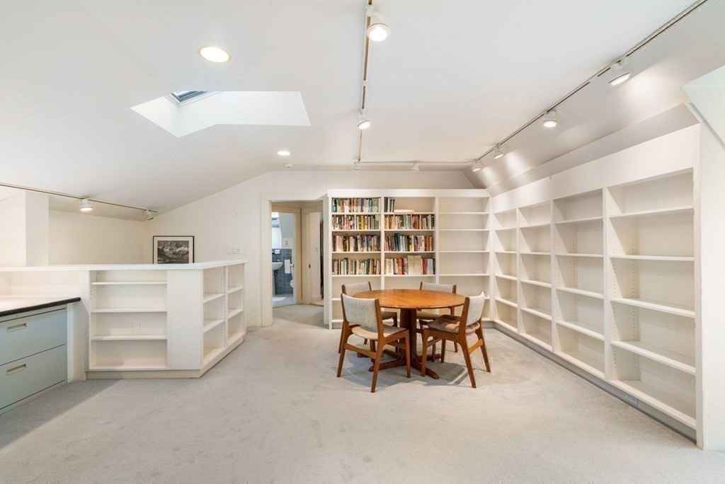 24 Percy Road Lexington, MA 02421 - Photo 28 of 38 a view of a livingroom with furniture and chandelier