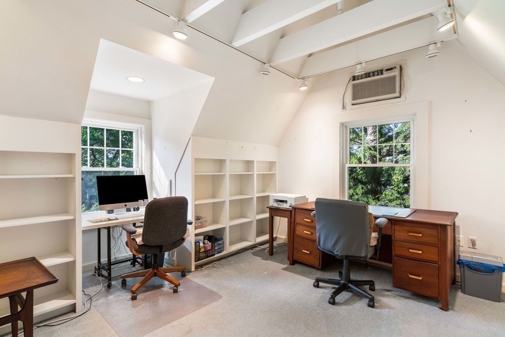 24 Percy Road Lexington, MA 02421 - Photo 30 of 38 a view of a workspace with furniture and a window
