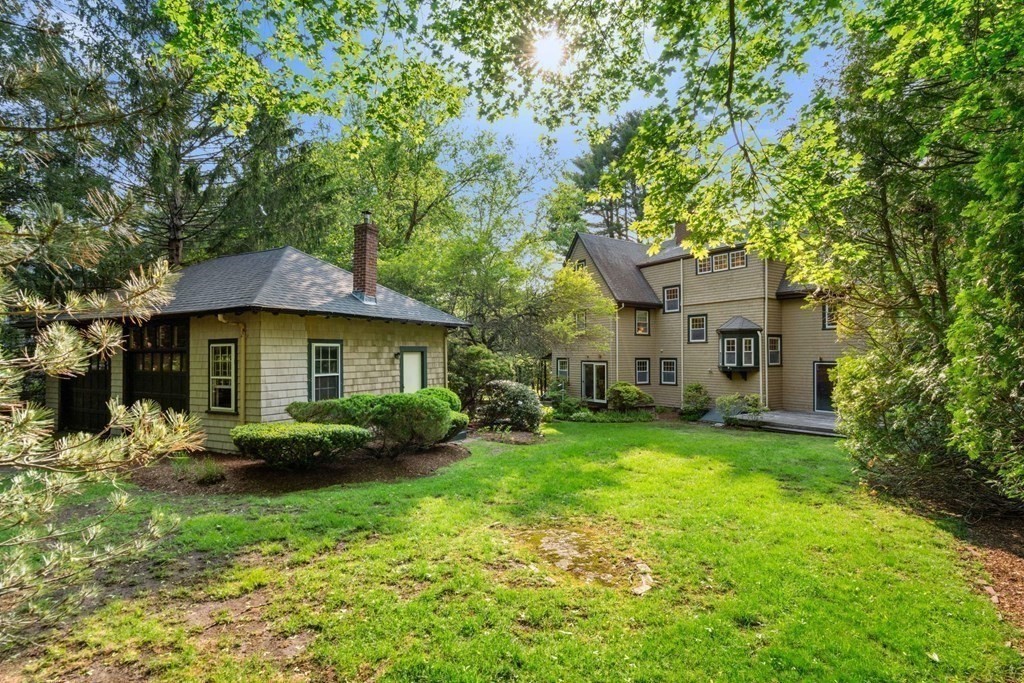 24 Percy Road Lexington, MA 02421 - Photo 33 of 38 a front view of a house with garden