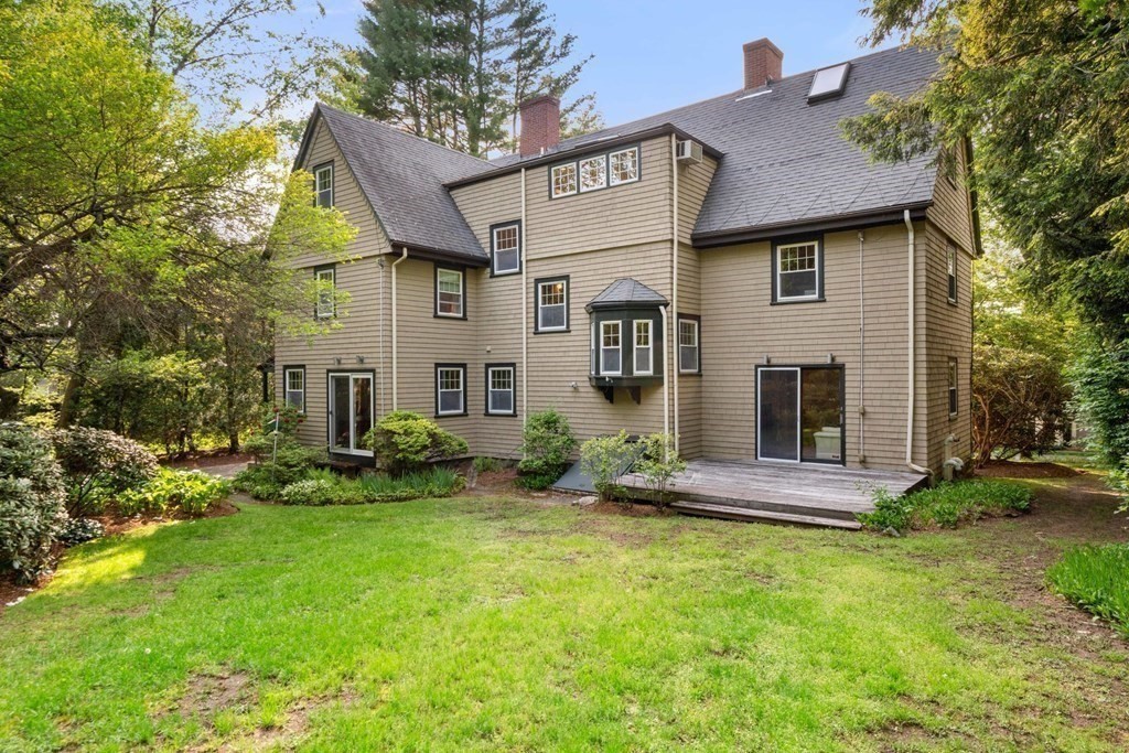 24 Percy Road Lexington, MA 02421 - Photo 34 of 38 a front view of a house with a yard