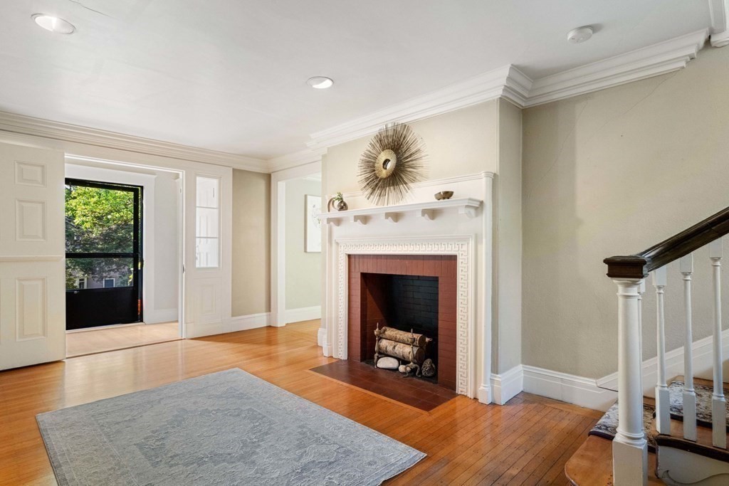 24 Percy Road Lexington, MA 02421 - Photo 4 of 38 a living room with furniture and a fireplace