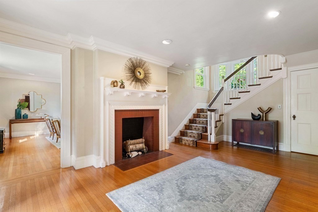 24 Percy Road Lexington, MA 02421 - Photo 5 of 38 a living room with furniture and a fireplace
