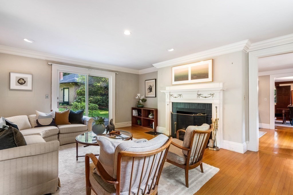 24 Percy Road Lexington, MA 02421 - Photo 6 of 38 a living room with furniture fireplace and a table