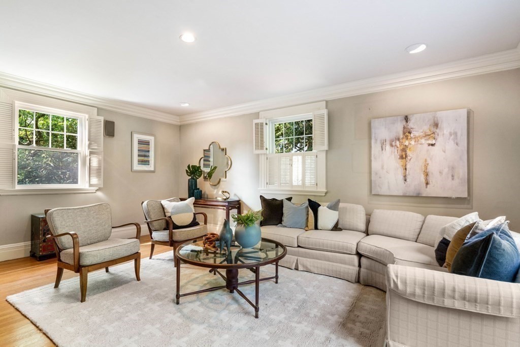 24 Percy Road Lexington, MA 02421 - Photo 7 of 38 a living room with furniture a couch and two windows