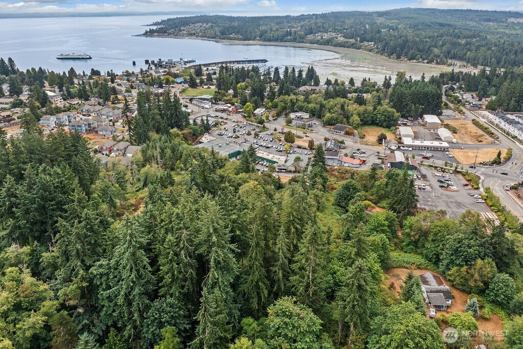 26516 Lindvog Road Northeast Kingston, WA 98346 - Photo 16 of 19 an aerial view of multiple house with yard and ocean view