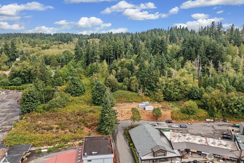 26516 Lindvog Road Northeast Kingston, WA 98346 - Photo 4 of 19 an aerial view of a city with lots of residential buildings
