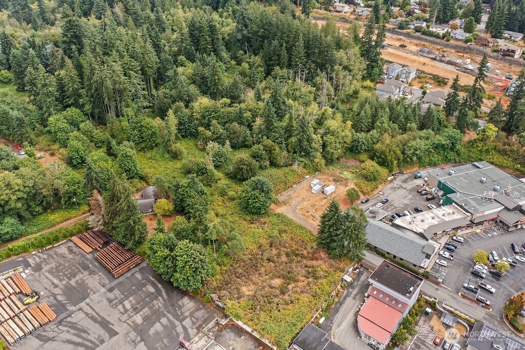 26516 Lindvog Road Northeast Kingston, WA 98346 - Photo 5 of 19 an aerial view of a house with a yard