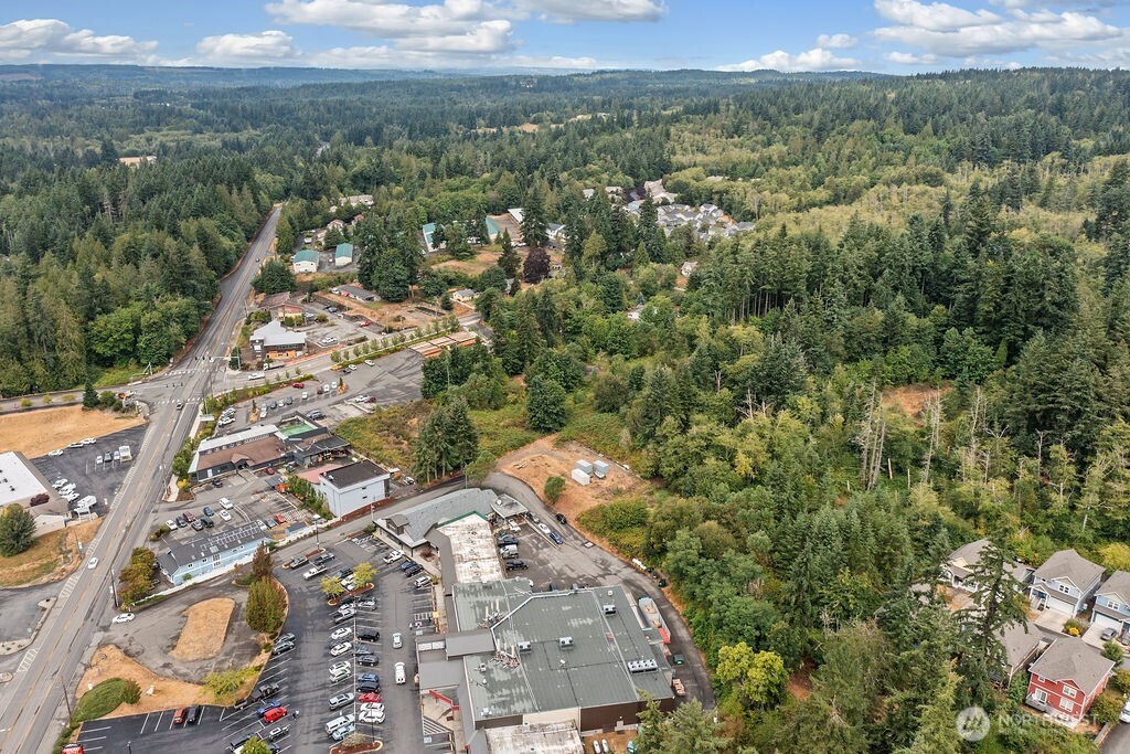 26516 Lindvog Road Northeast Kingston, WA 98346 - Photo 8 of 19 an aerial view of a house with a yard
