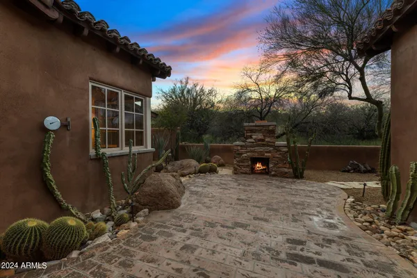 a view of a roof deck with a patio