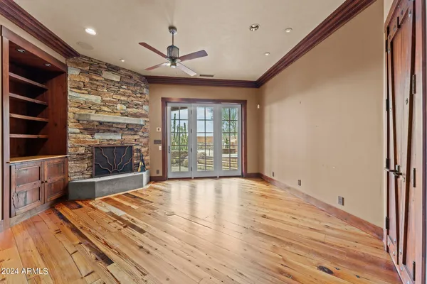 a kitchen with stainless steel appliances granite countertop a stove a refrigerator and a sink