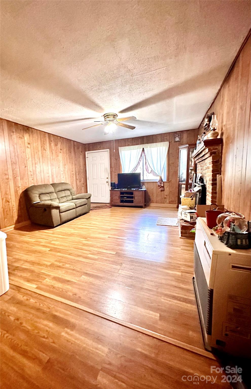 186 Stiles Road Waynesville, NC 28786 - Photo 6 of 18 a large room with a large window and furniture