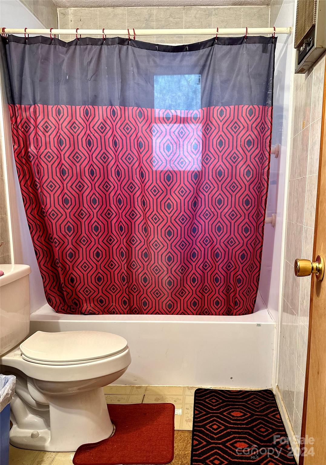 186 Stiles Road Waynesville, NC 28786 - Photo 9 of 18 a bathroom with a toilet and a sink