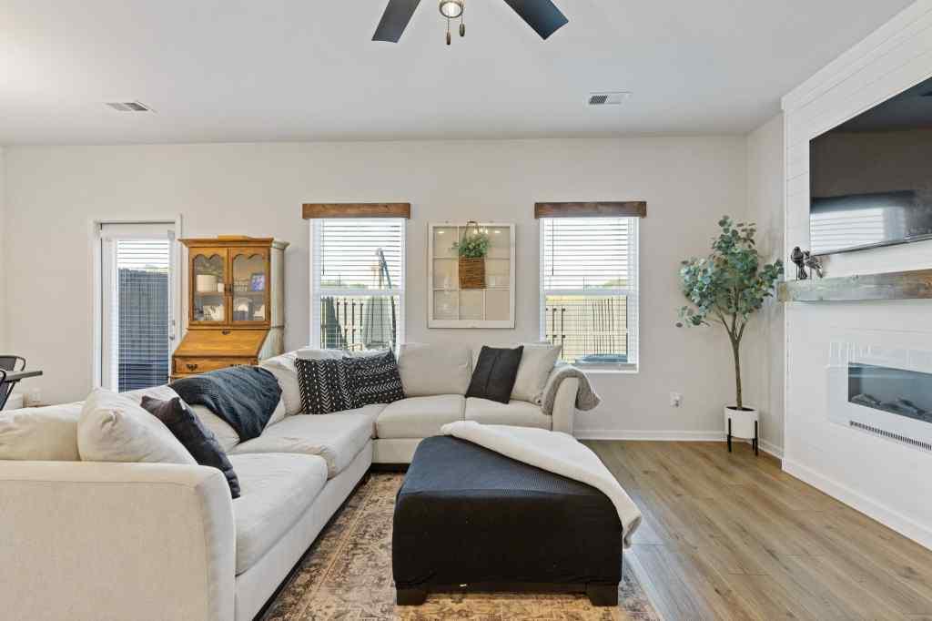 60 Huntley Trace Hoschton, GA 30548 - Photo 12 of 50 a living room with furniture and a large window