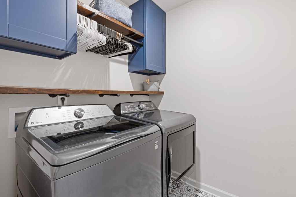 60 Huntley Trace Hoschton, GA 30548 - Photo 22 of 50 a utility room with dryer and washer