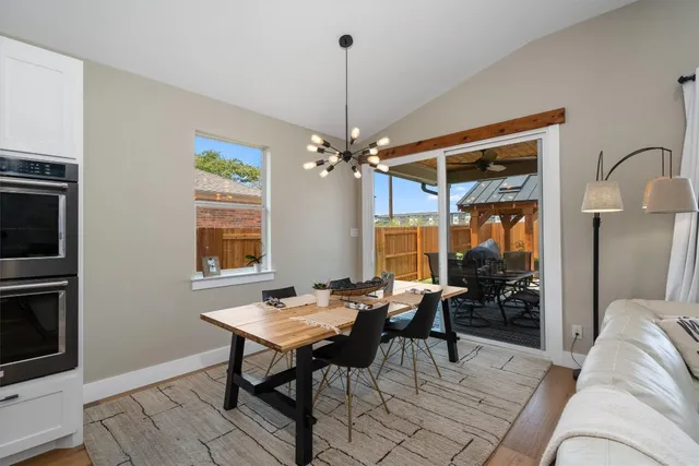 a view of a livingroom with furniture and window