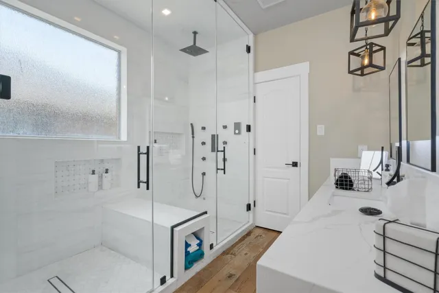 a bathroom with a sink and mirror