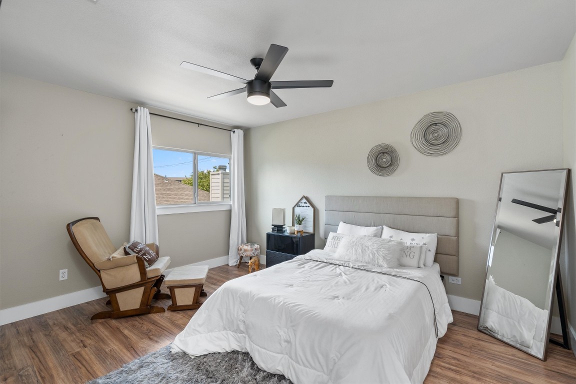 542 Centerbrook Place Round Rock, TX 78665 - Photo 29 of 40 a bedroom with a bed and chair