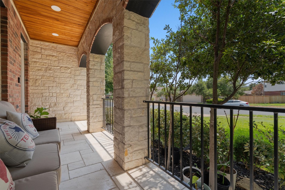 542 Centerbrook Place Round Rock, TX 78665 - Photo 3 of 40 a view of a balcony with potted plants