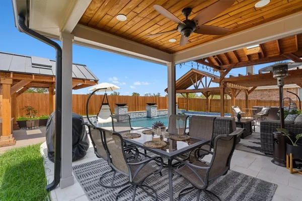 a view of an outdoor space with furniture