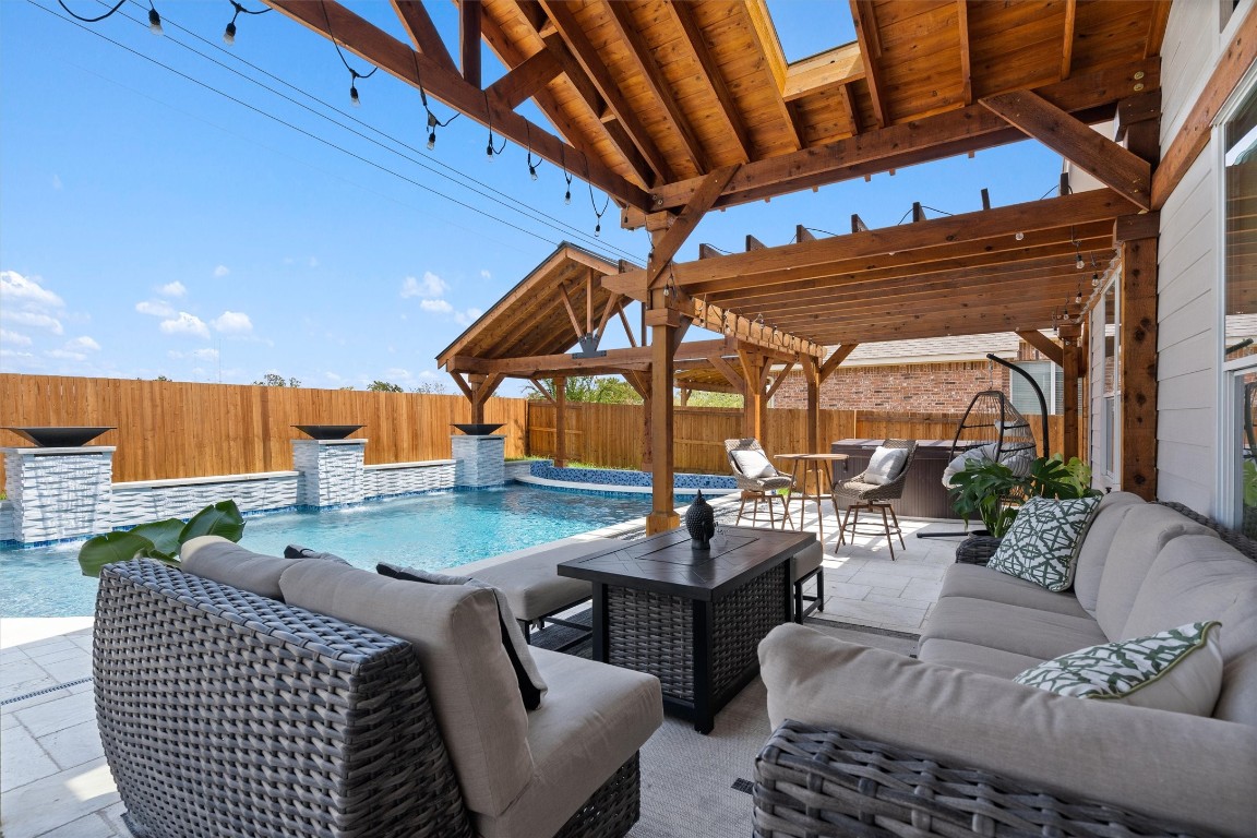 542 Centerbrook Place Round Rock, TX 78665 - Photo 32 of 40 a outdoor space with patio couches table and chairs with potted plants