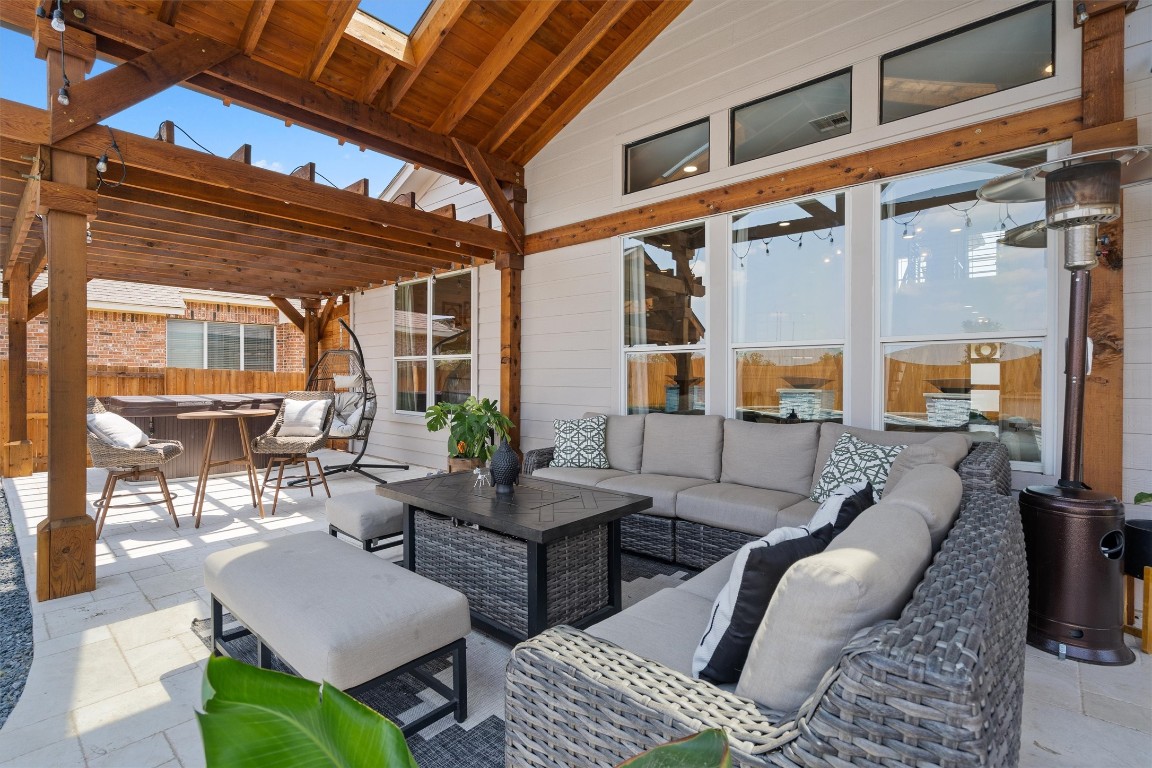 542 Centerbrook Place Round Rock, TX 78665 - Photo 34 of 40 a outdoor space with patio couches and a dining table with chairs